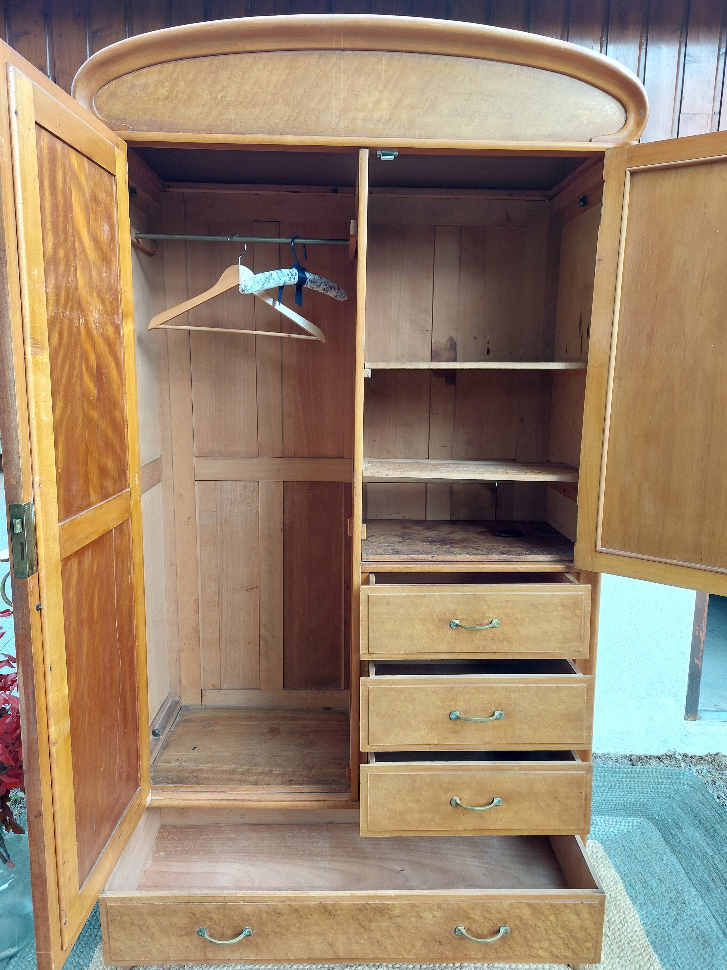 triple function wardrobe, hanging rail