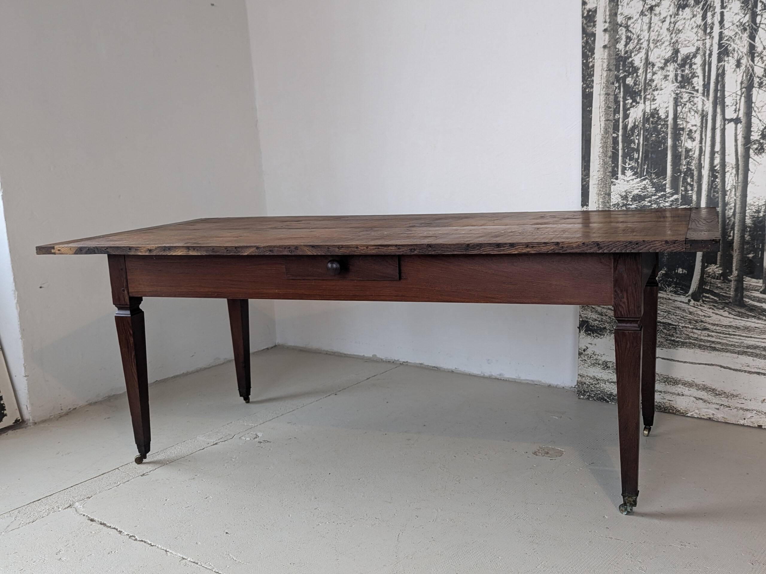 Campaign table in solid oak, Directoire style.