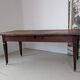 Campaign table in solid oak, Directoire style.