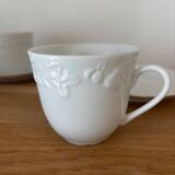 5 cups, 4 saucers and a creamer in Philippe Deshoulières porcelain