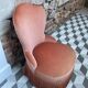 Fauteuil chauffeuse vintage velours saumon