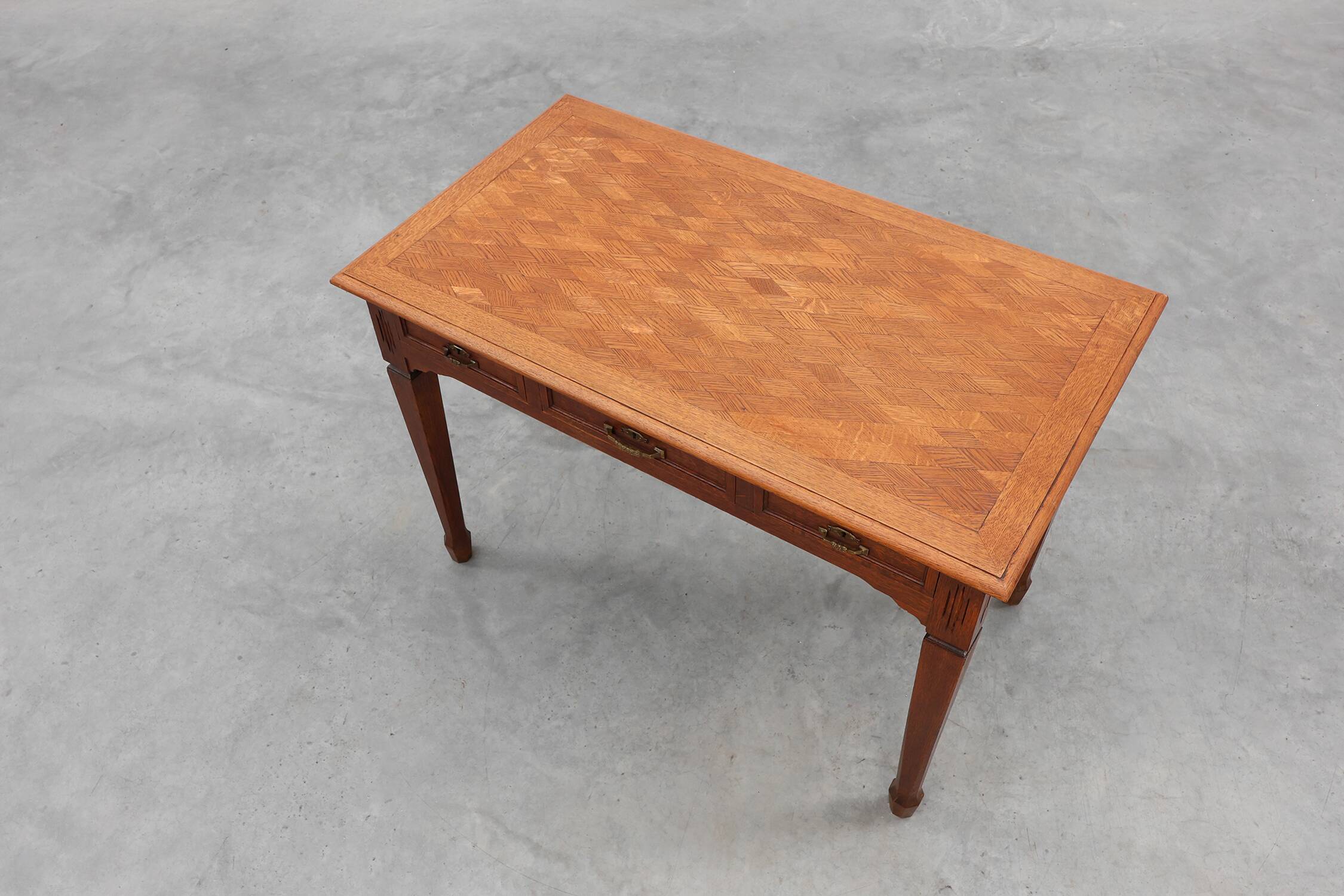 Art Deco carved oak Desk or Table with copper details, Belgium 1920s