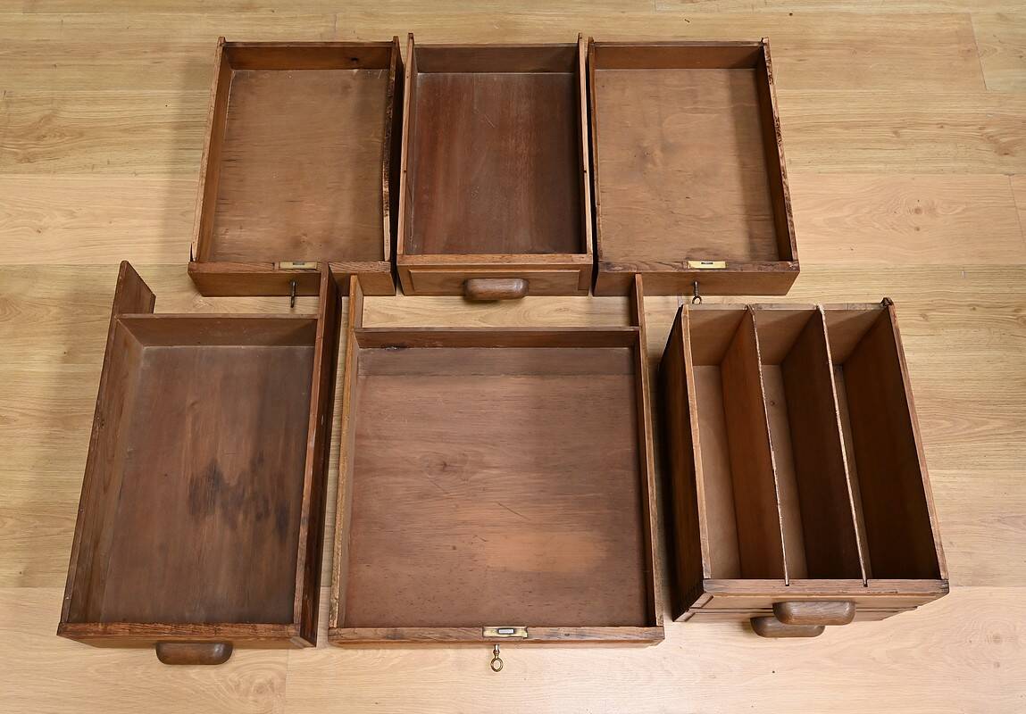 Solid oak pedestal desk, Régy establishments – 1940