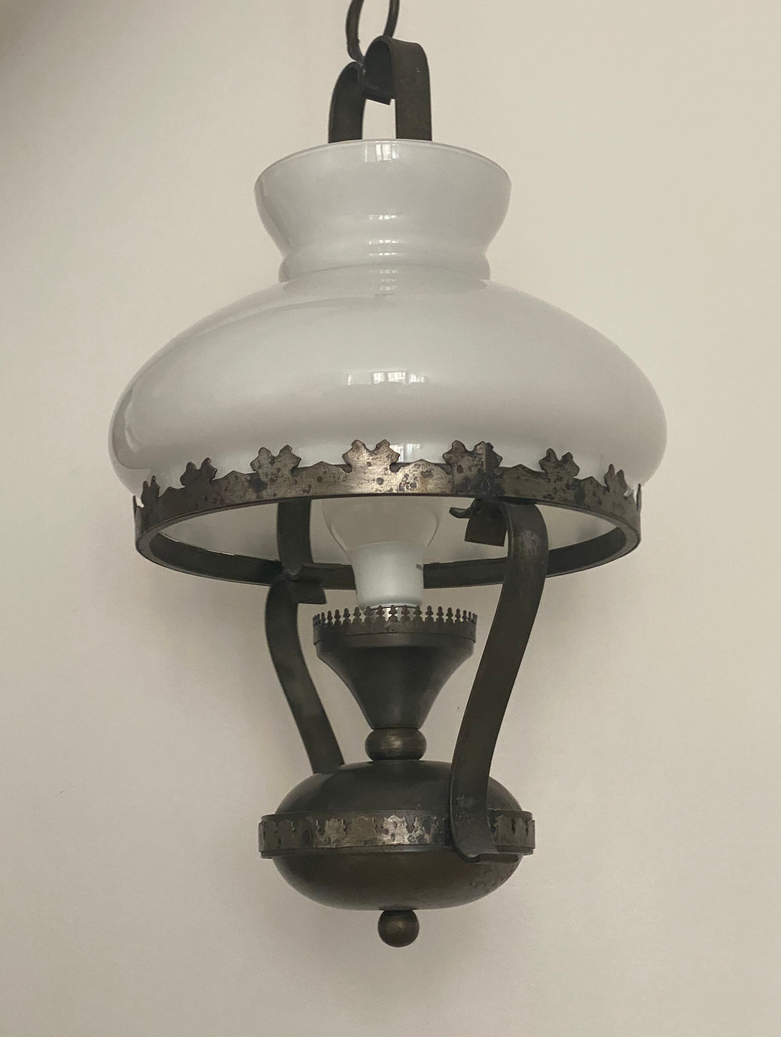 Metal chandelier and opaline glass gloss