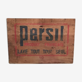 Ancienne boîte en bois contenant des paquets de lessive Persil