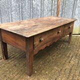 Old coffee table from the Guérandais region in solid oak with 2 front drawers