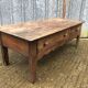 Old coffee table from the Guérandais region in solid oak with 2 front drawers