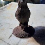 2 roosters and 2 cast iron birds