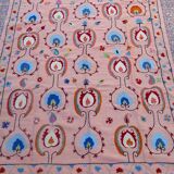 Salmon pink suzani kilim rug with embroidered patterns