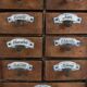 Cabinet à épices en bois rustique espagnol avec étiquettes en céramique, années 1930