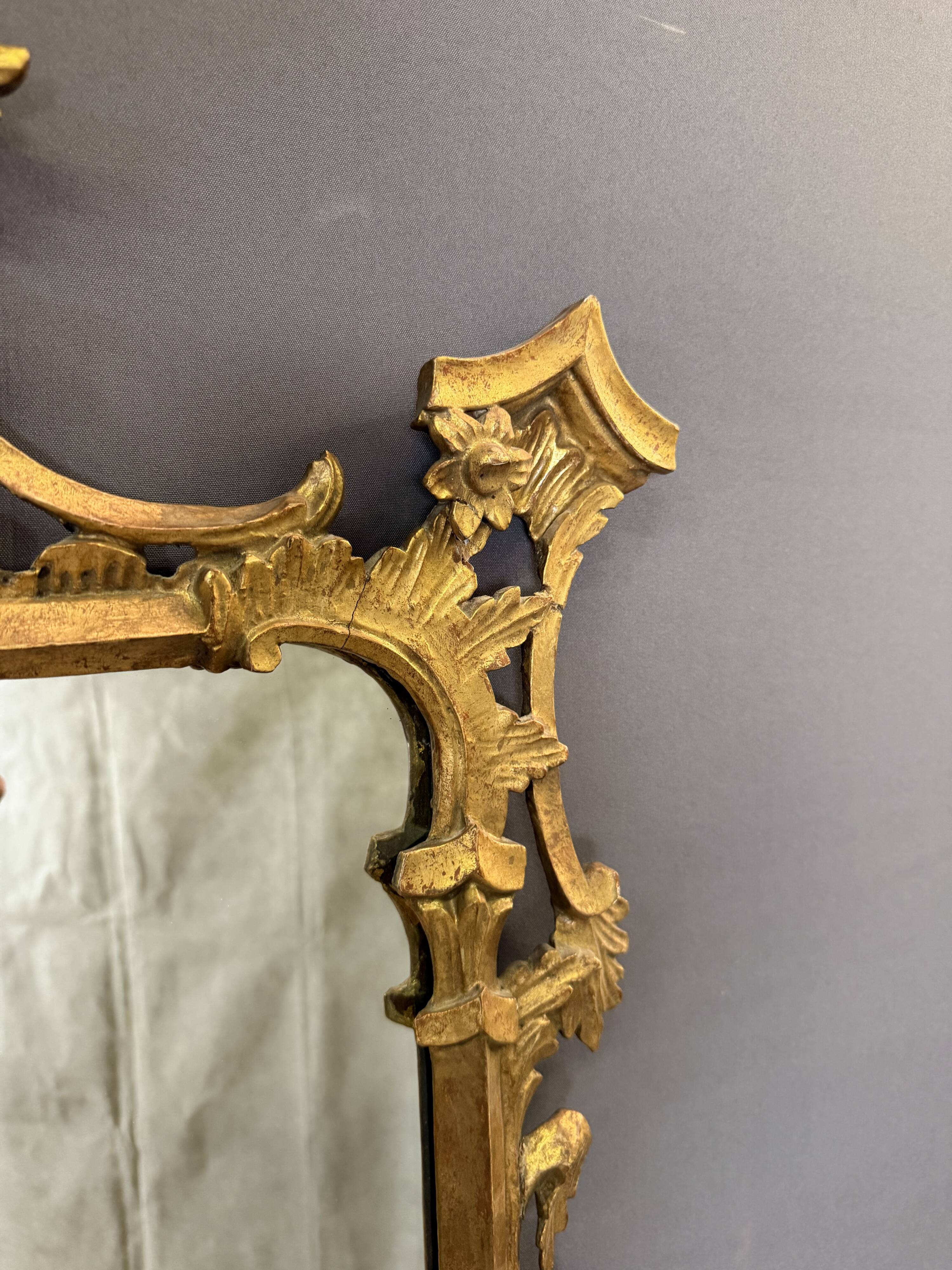 Italian mirror in gilded wood from the 19th century.