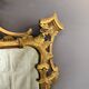 Italian mirror in gilded wood from the 19th century.