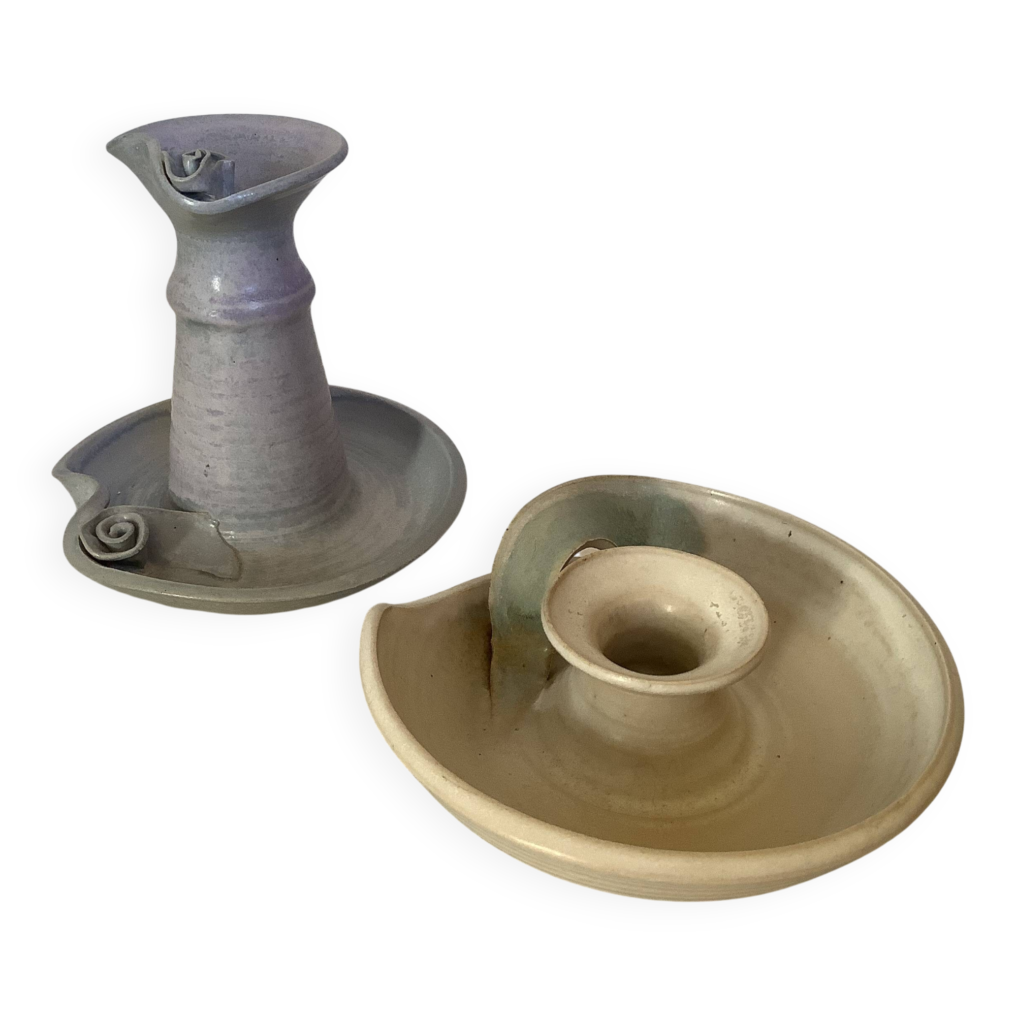 Pair of signed ceramic candlesticks