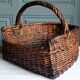 Handmade woven and dyed willow harvest basket.