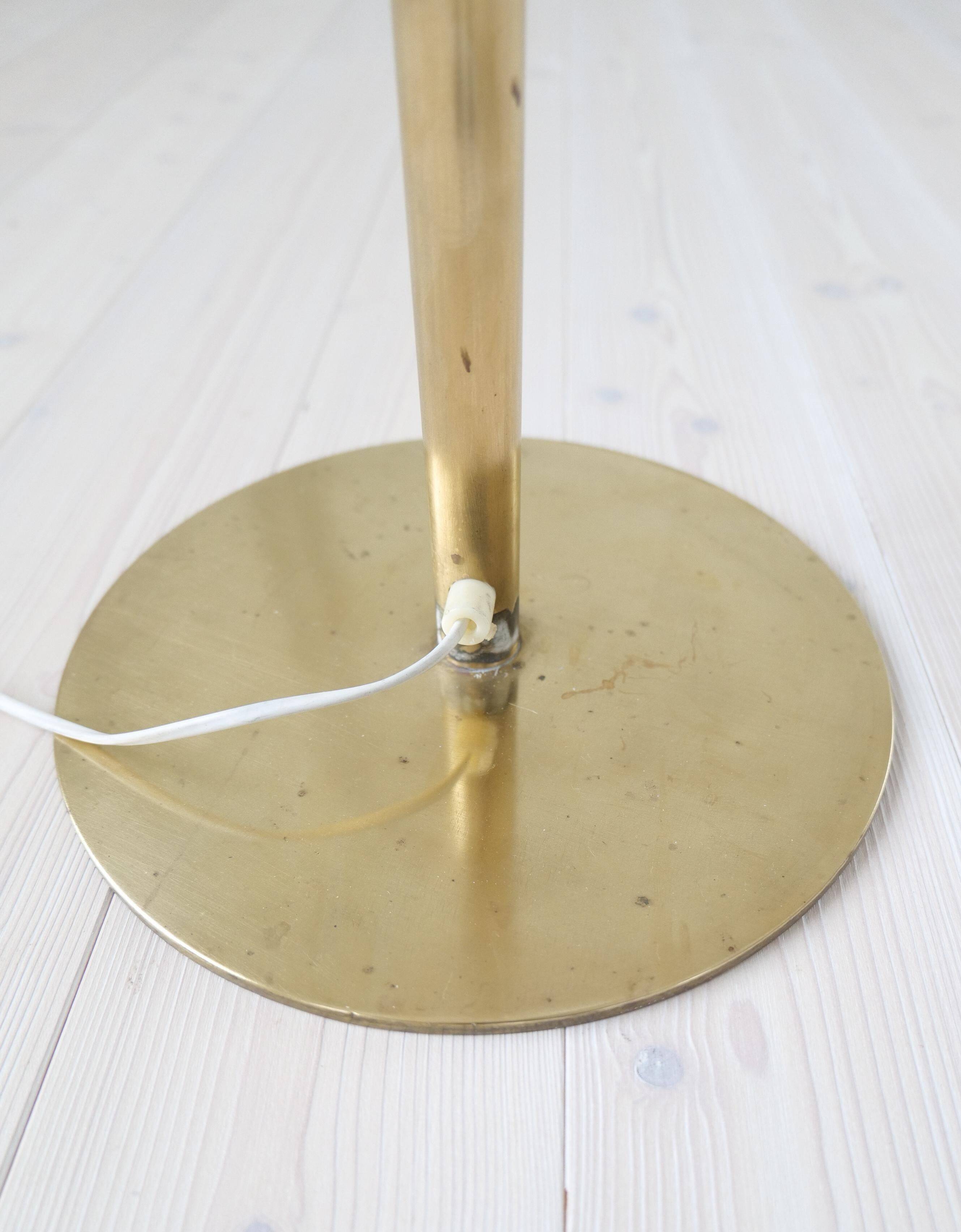 Sculptural modern brass floor lamps from the mid-century Luxus, Sweden, 1970s.