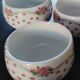 Service of small six cups for tea, cream, fruit salad or coffee