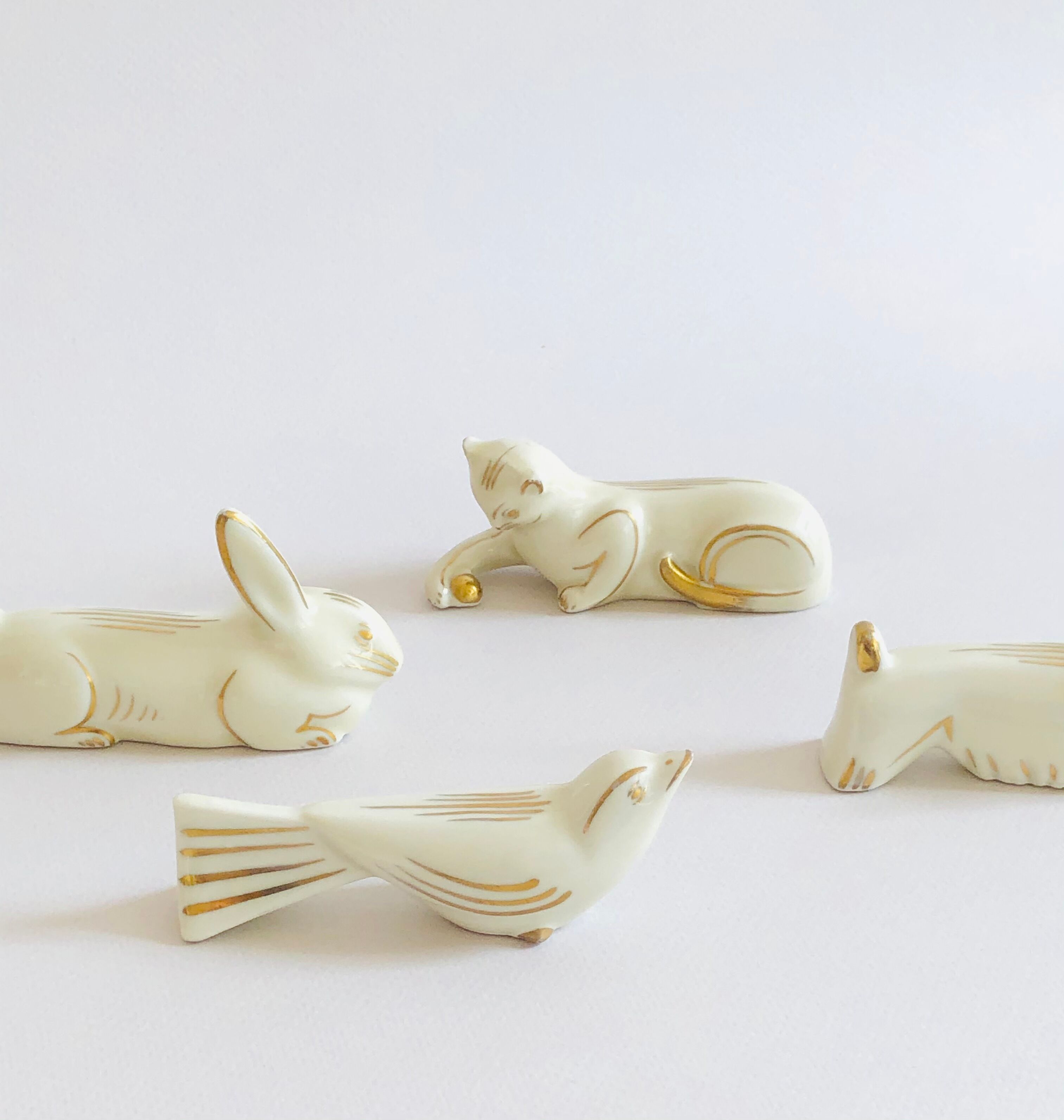 Set of 8 art deco ceramic animal knife holders