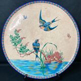 Round polychrome enamel dish with bird decoration circa 1900