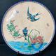 Round polychrome enamel dish with bird decoration circa 1900