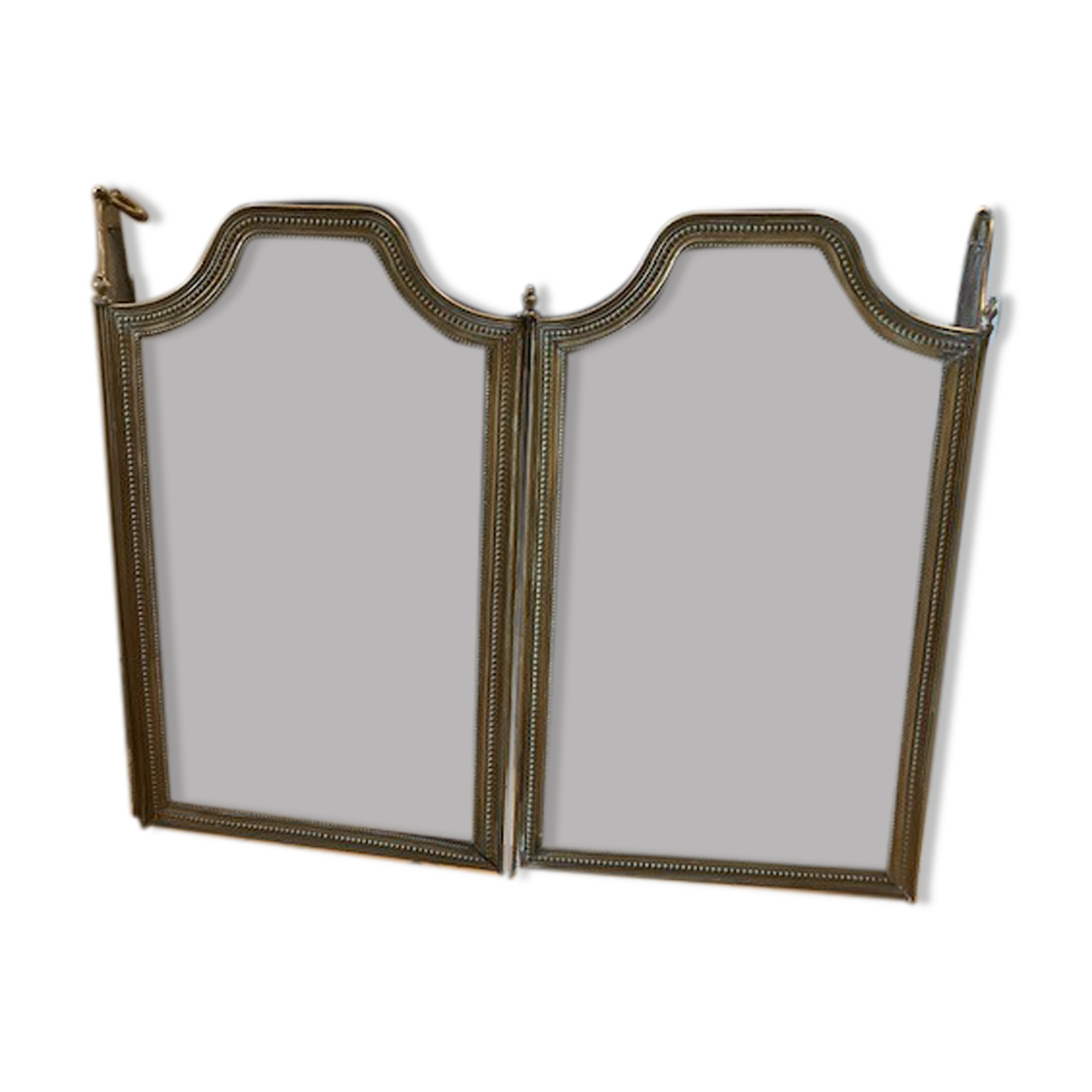 Old brass fire shield