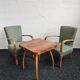 Halabala “Spider” coffee table and Hungarian late Art Deco armchairs, 1950s