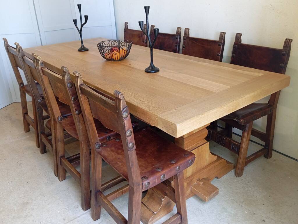 Set of 8 walnut and leather chairs from the 1950s