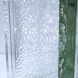 Two designer glass paving pockets