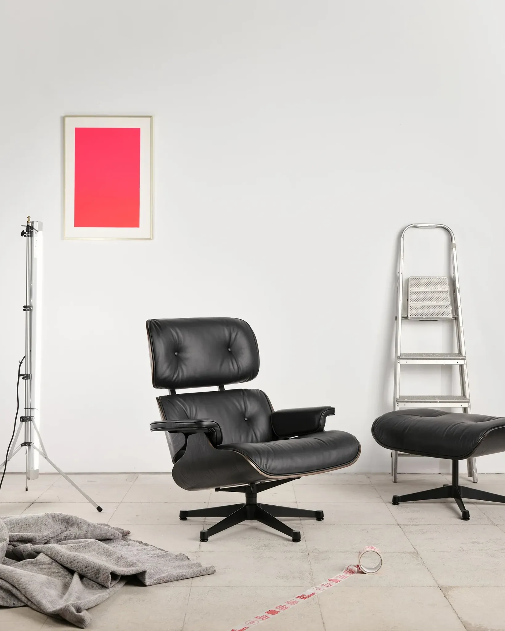 Lounge Chair and ottoman in black leather by Charles & Ray Eames, Vitra