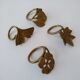 Vintage vegetable brass napkin rings