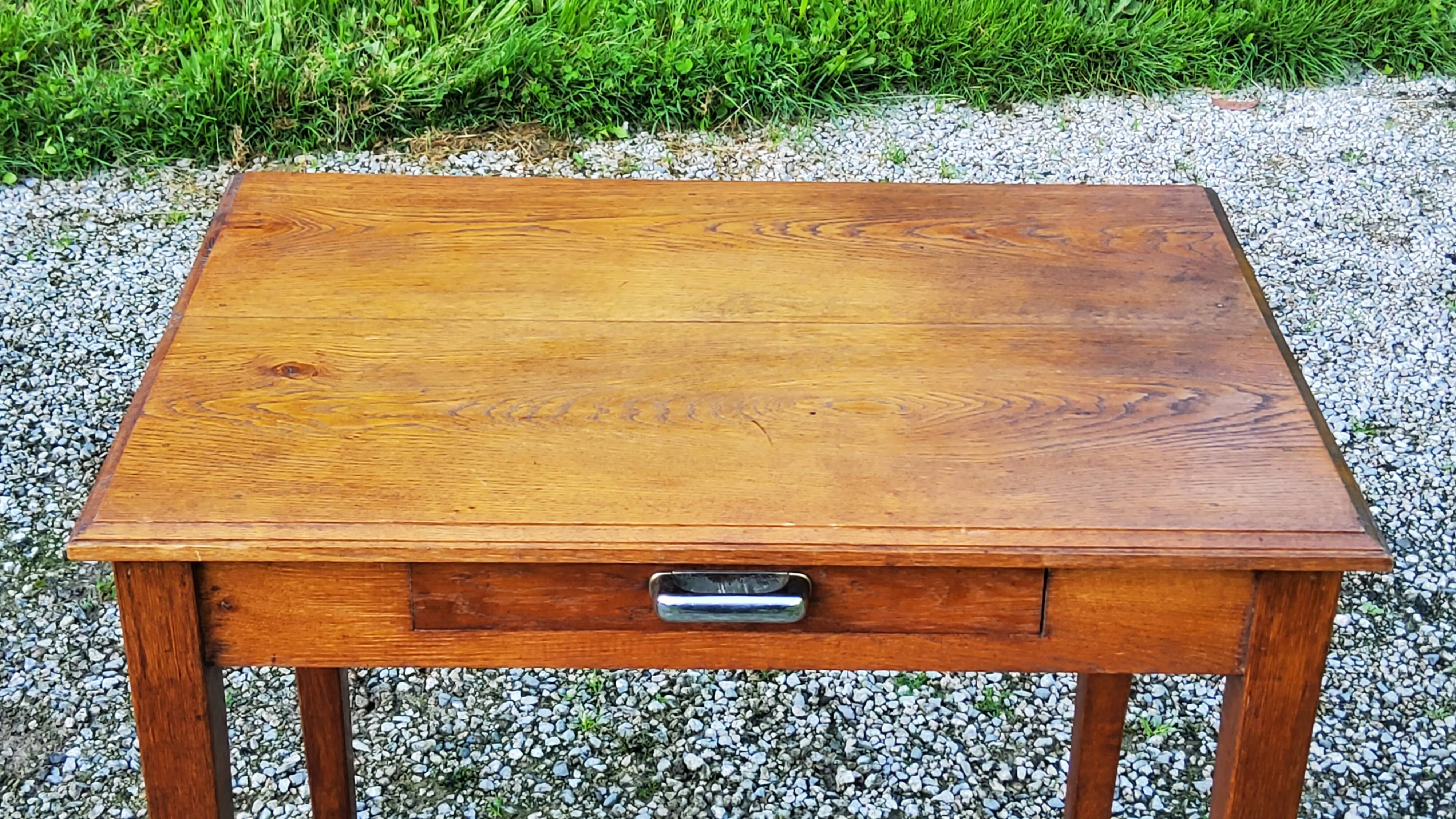 Oak writing table with spindle legs, early 20th century