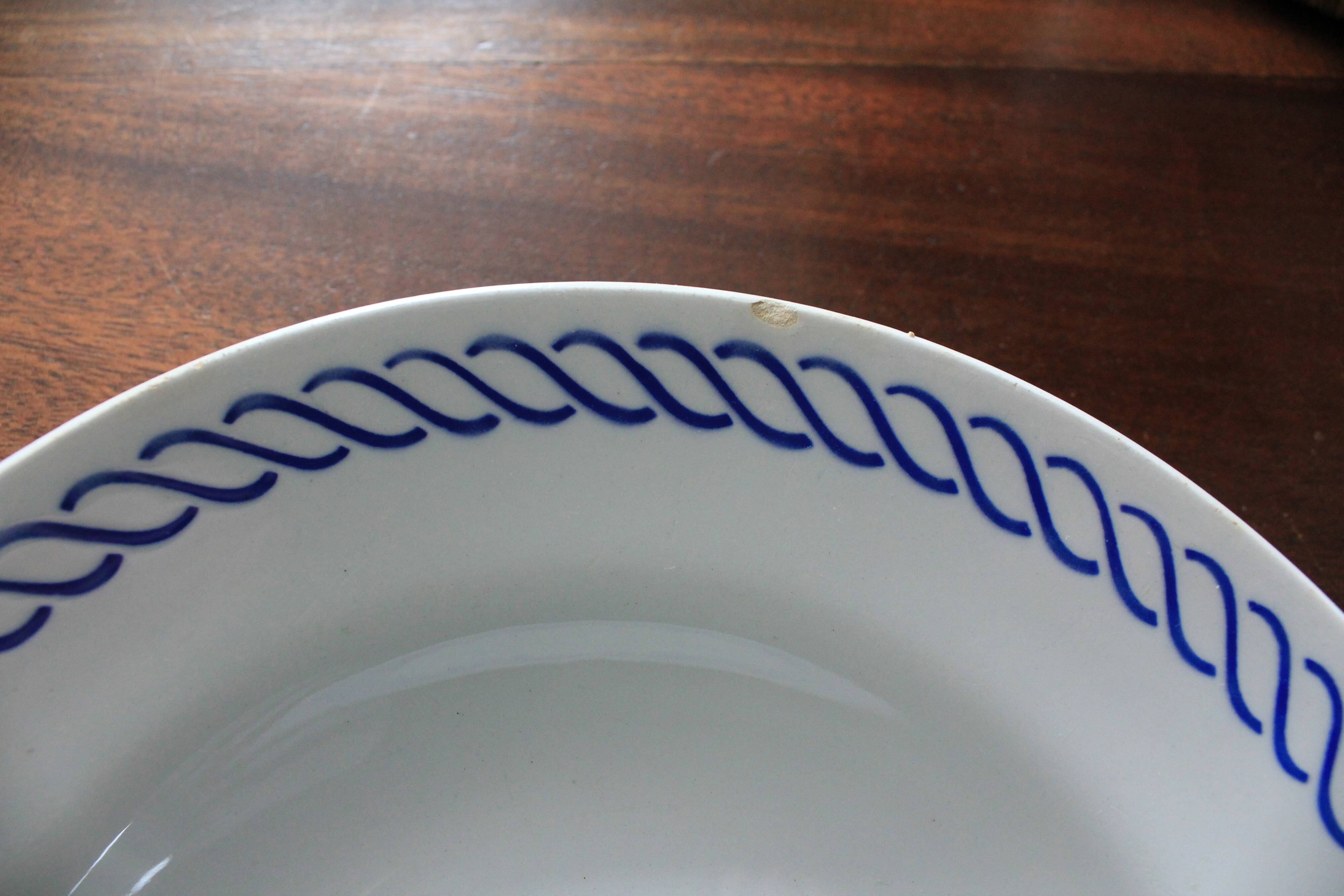 Deep plate with royal blue geometric pattern marked on the back FB 45.