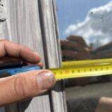Large decorative mirror in carved wood with shabby patina