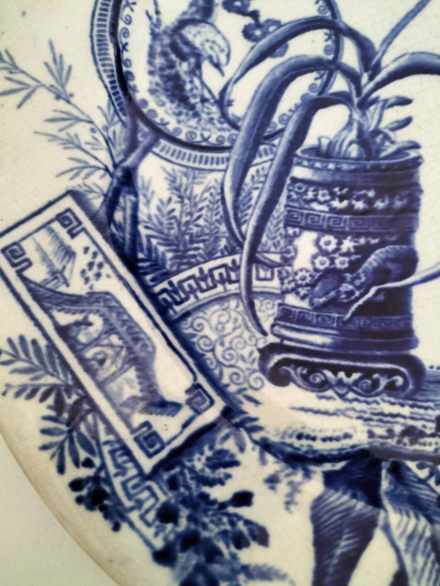 Antique plate with Chinese blue oriental decoration from the late 19th century.