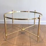 Round brass coffee table. Maison Baguès
