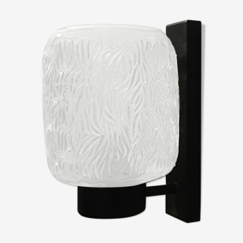 Black metal and molded glass wall sconce