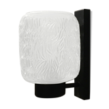 Black metal and molded glass wall sconce