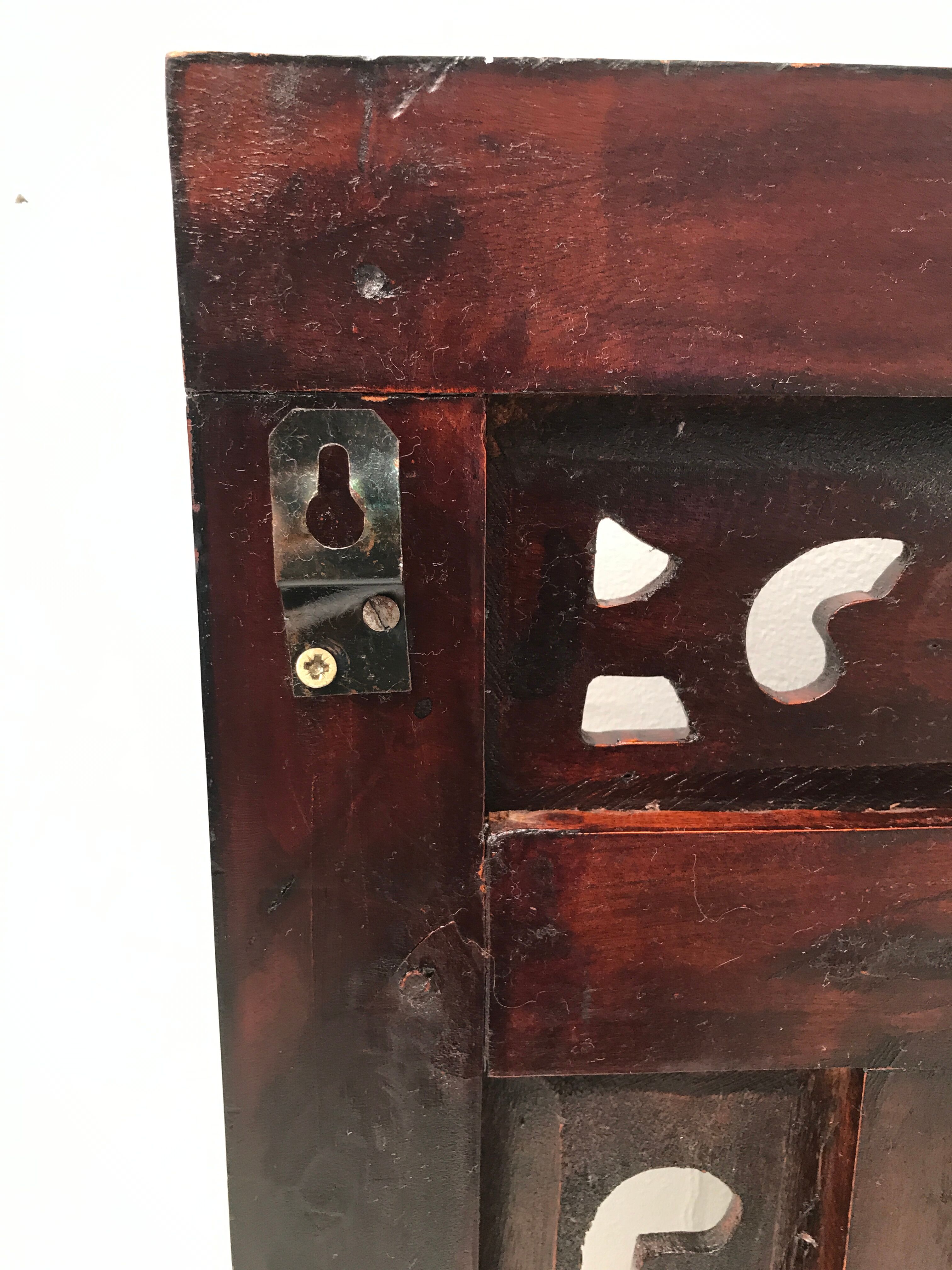 Vintage shuttered Indonesian mirror