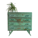 Vintage compass leg commode with a patina.