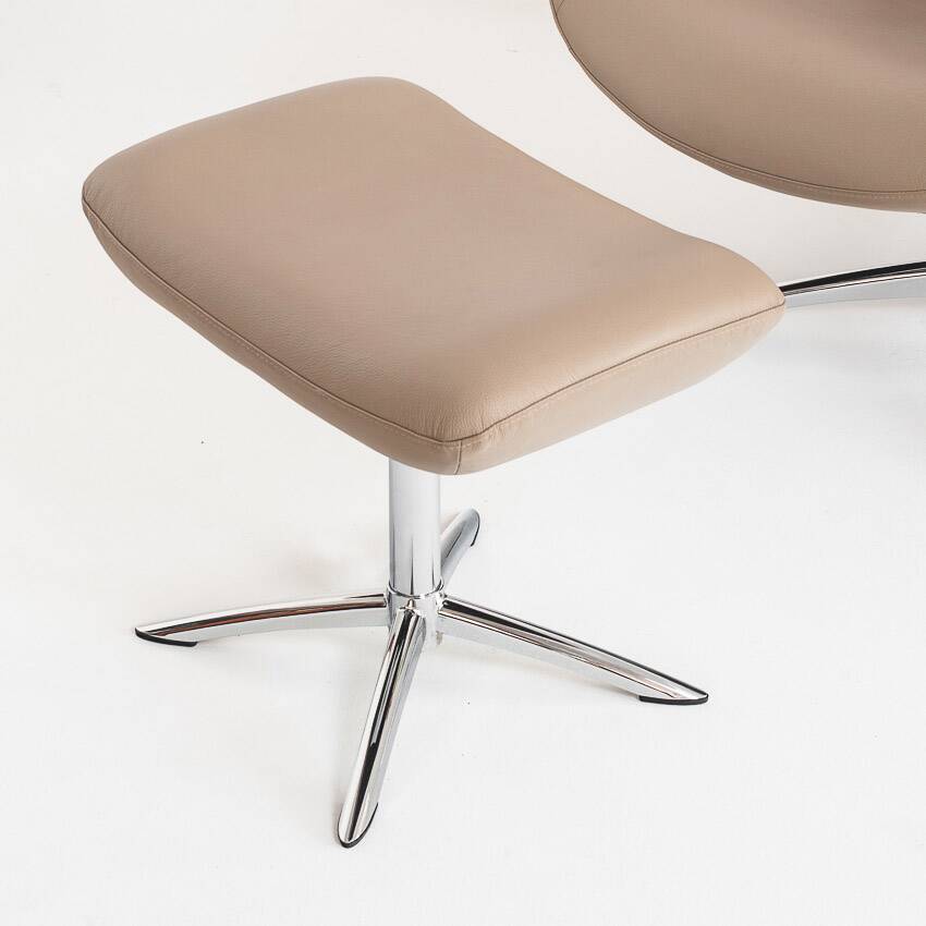 Leather armchair with footstool. Lotus model. Manufacturer: Kebe. Denmark
