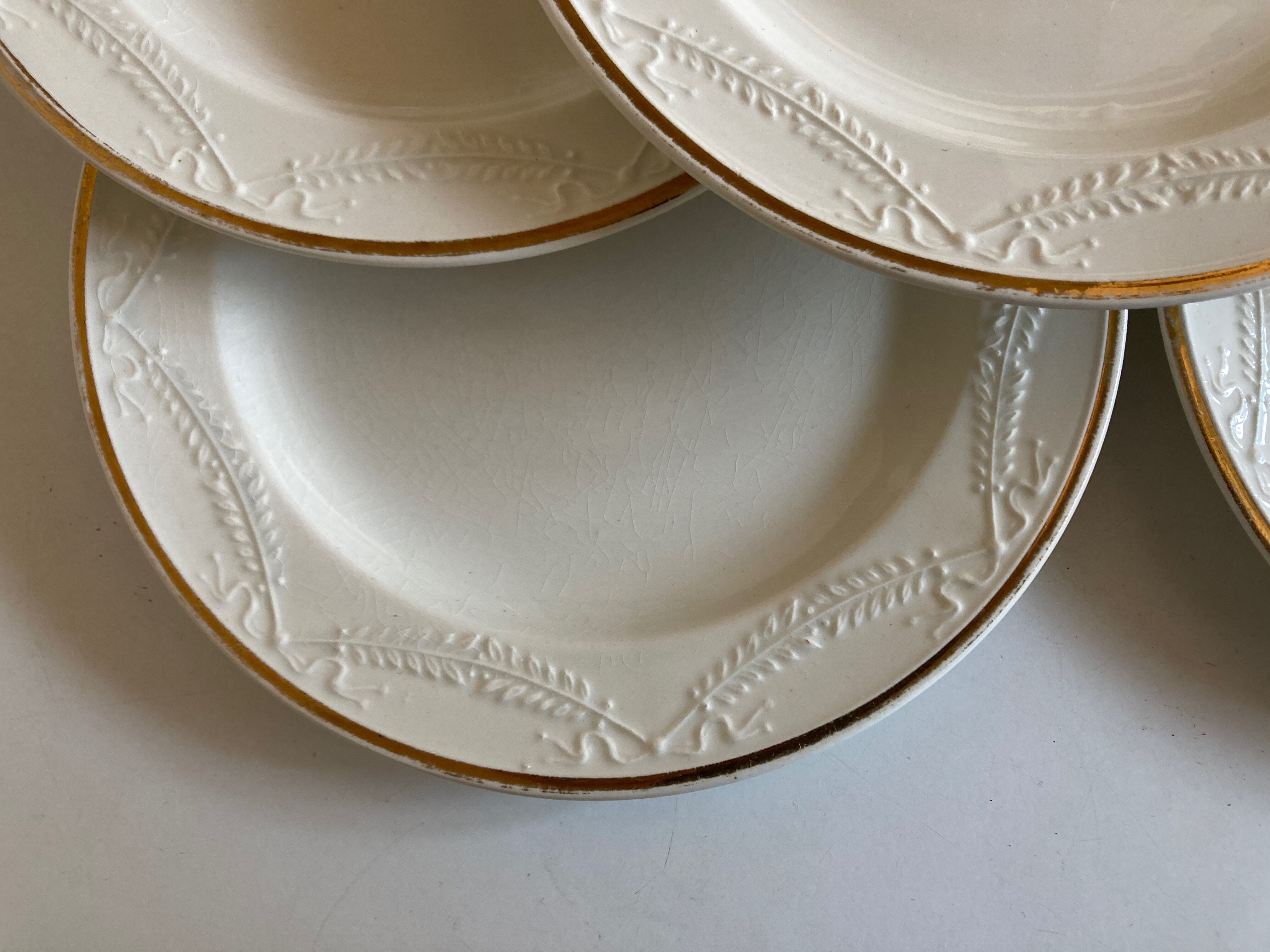 Set of 7 neo-classical plates directoire fine earthenware from Gien 19th