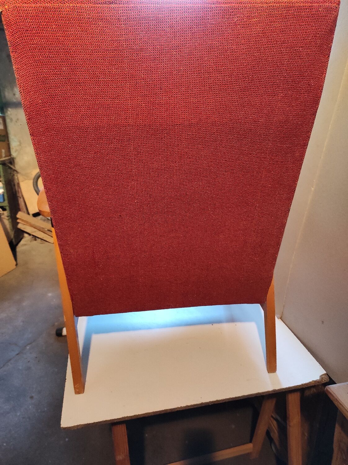 Vintage red armchair with compass feet in Scandinavian design