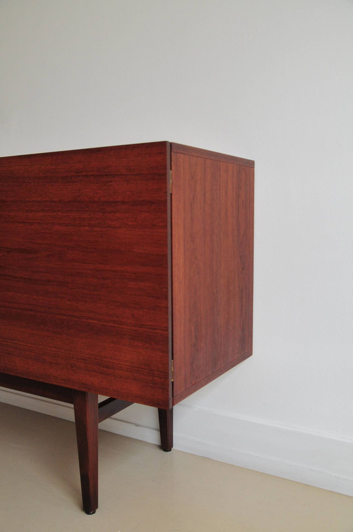 vintage Danish sideboard with black and white drawers