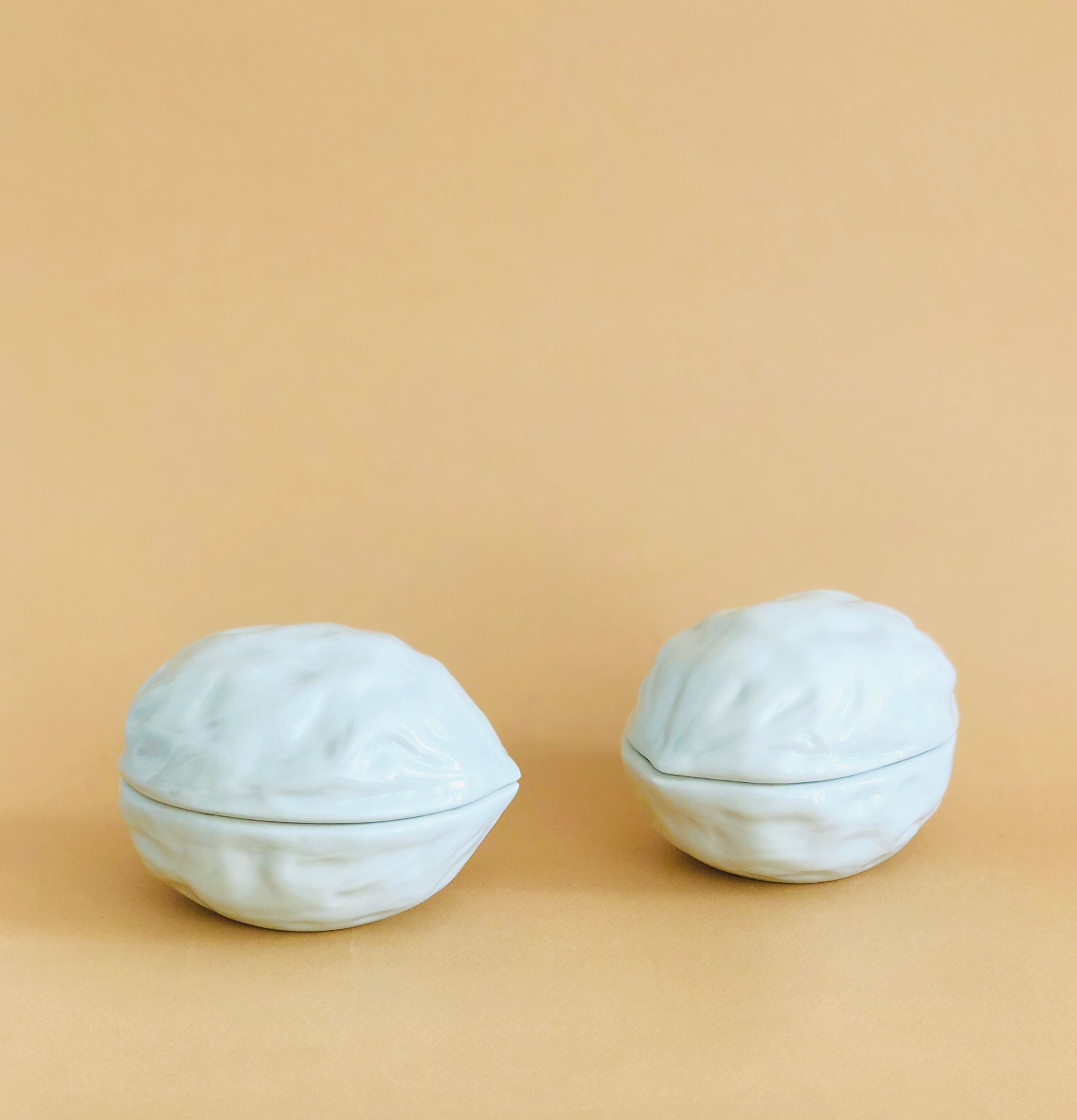 Pair of Limoges porcelain nut boxes