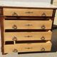 Old chest of drawers with white marble.