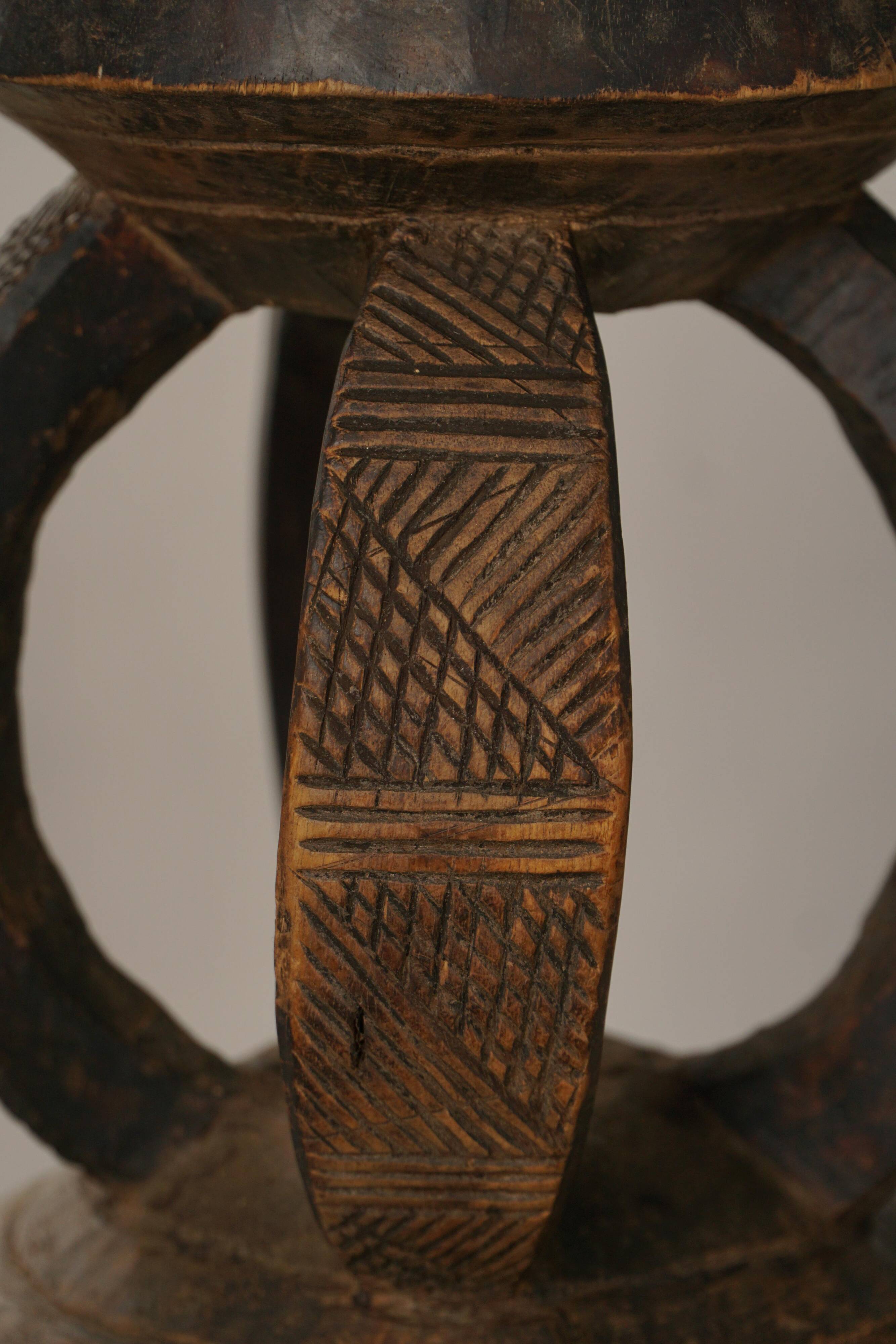 African Dogon stool from the mid-20th century, hand-carved in wood, Wabi-Sabi style.