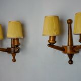 Pair of two-armed art deco wall lights, carved wood, France, 1960