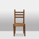 Ensemble de 8 chaises paillées en chêne. Années 1950.