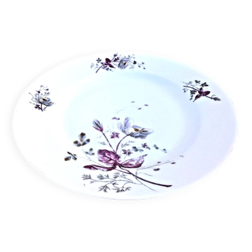 Antique white porcelain shallow dish with floral decoration.