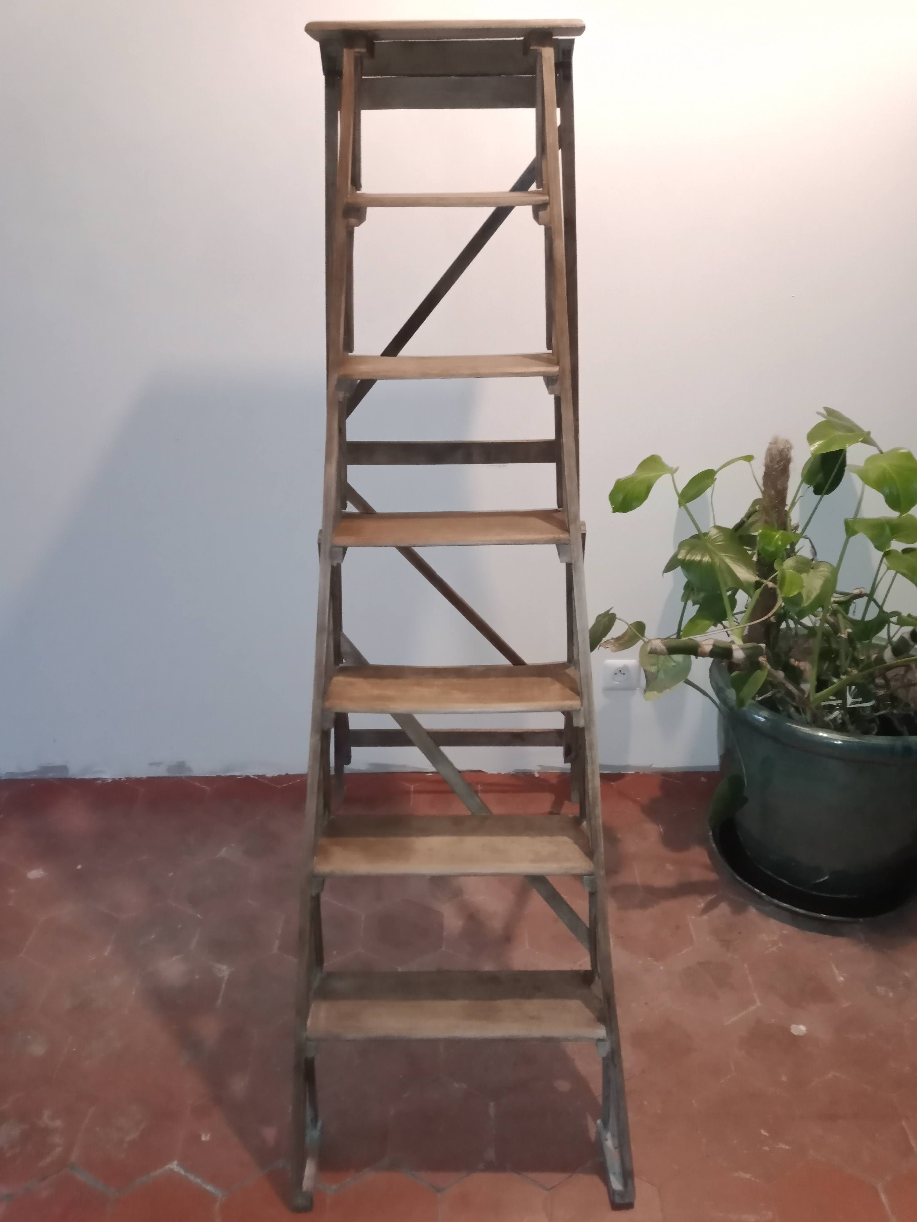 Old wooden stepladder six steps