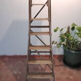 Old wooden stepladder six steps